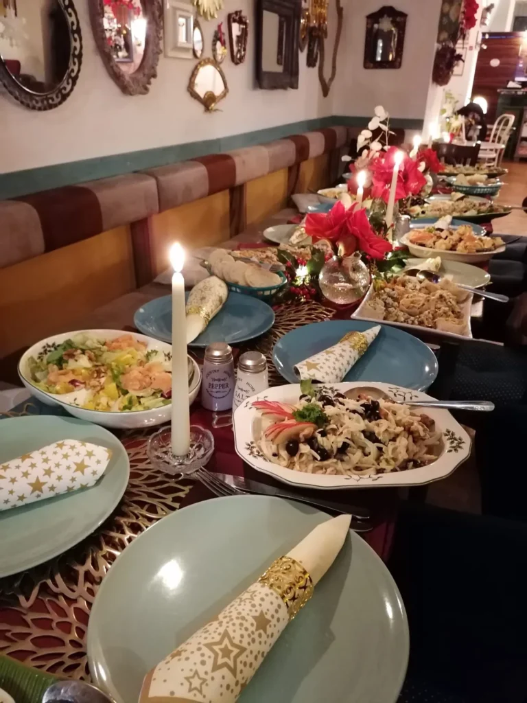 Long table with candles and food