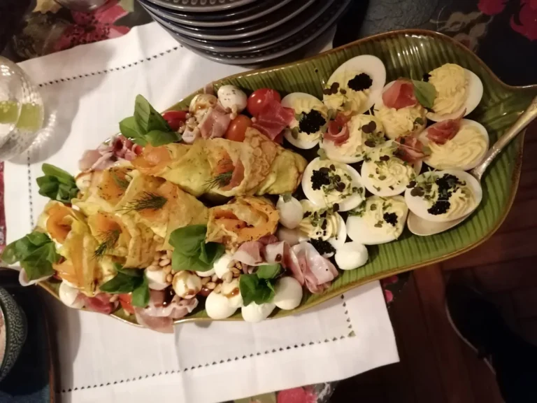 Stuffed eggs and finger food on a platter