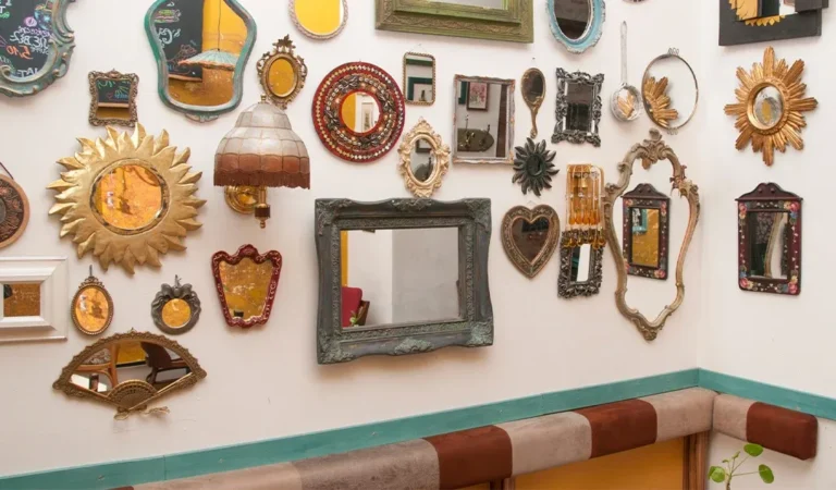 Wall with mirrors and pictures